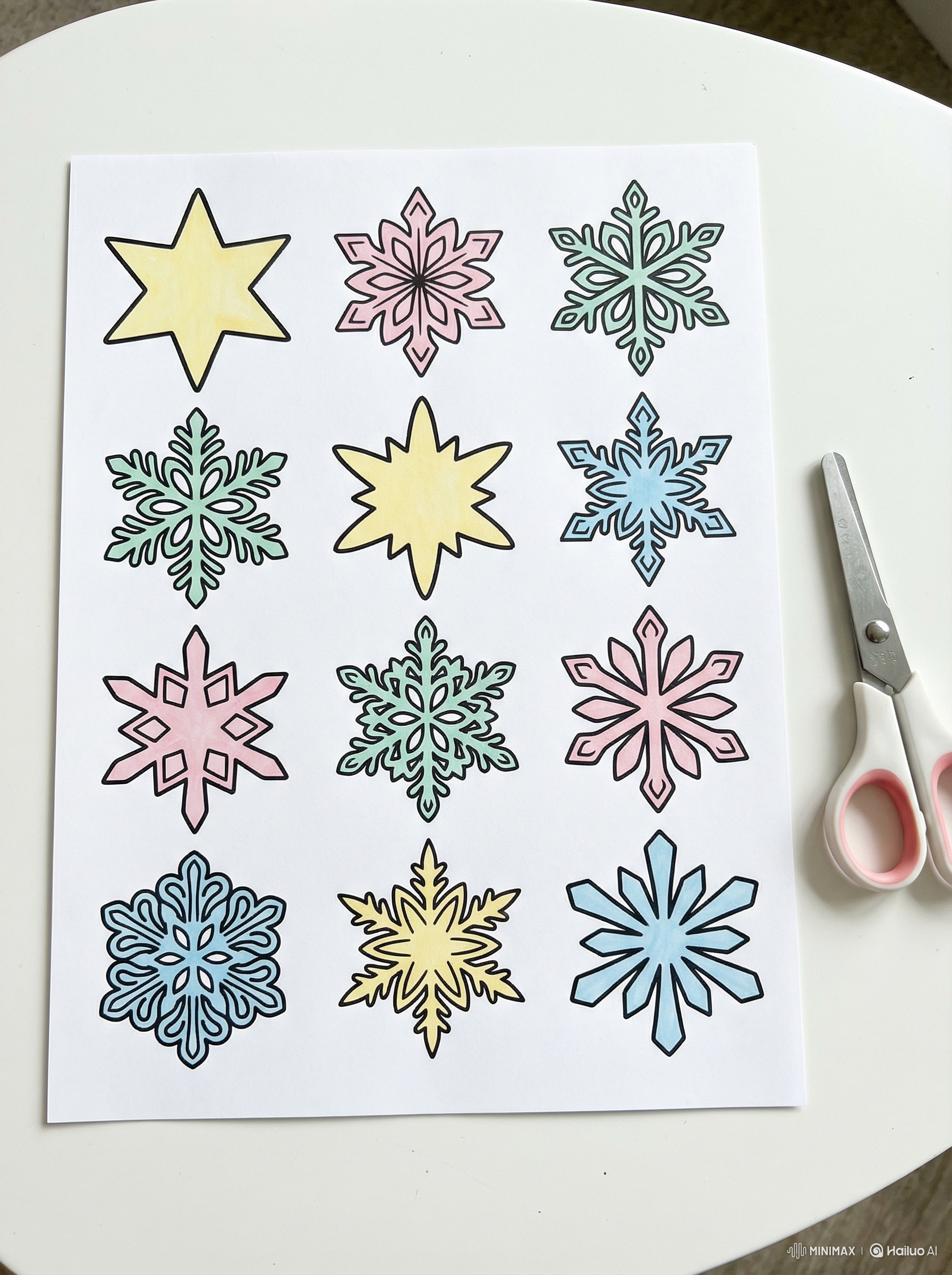 Sheet of colored snowflake and star stickers on a white surface with scissors.